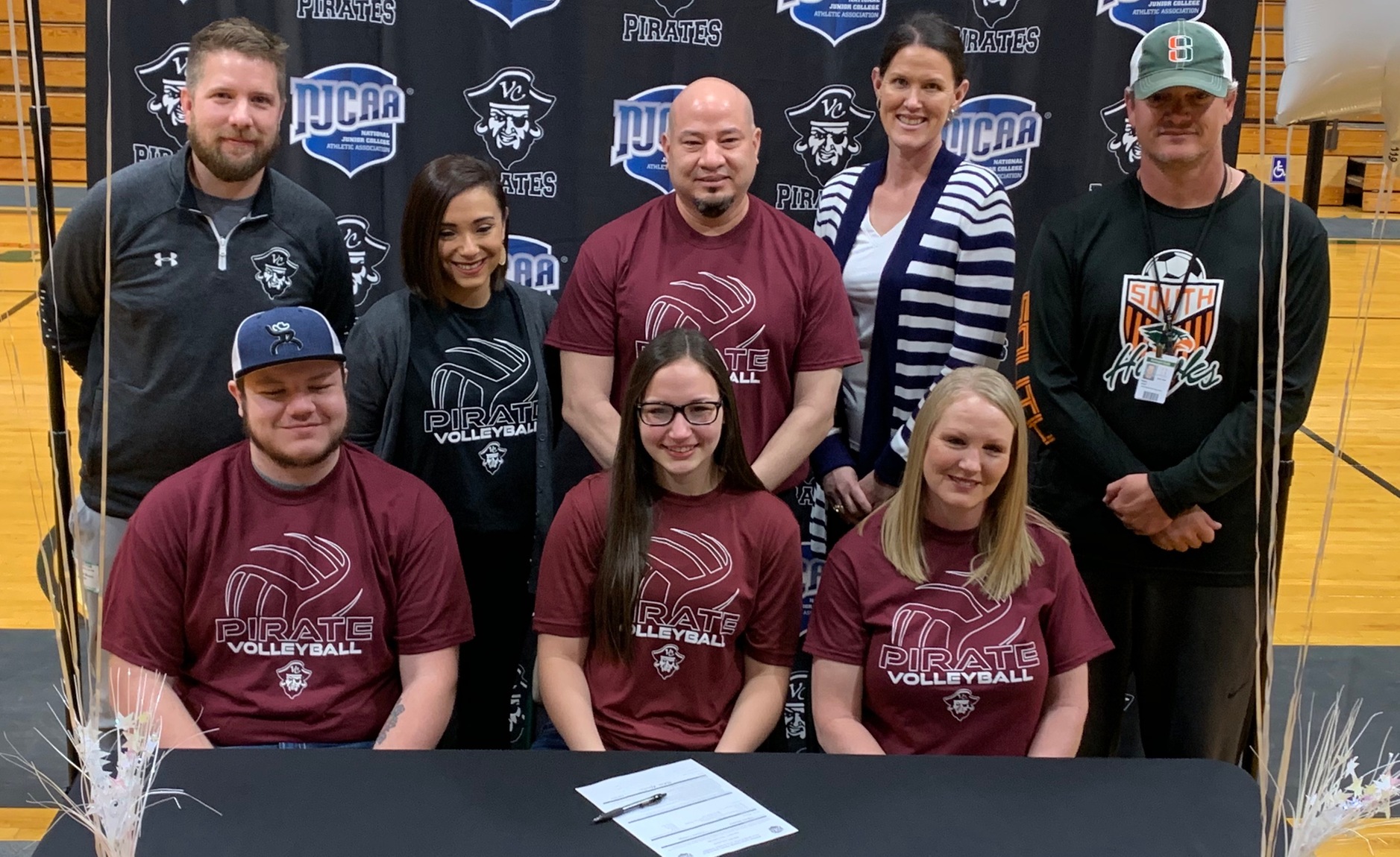 Harlingen South's Mikela Mireles signed a volleyball letter-of-intent with Victoria College on Tuesday. Seated next to Mireles are her brother, Miguel Mireles Jr., and mother, Sherri Mireles. Standing from left are VC Head Volleyball Coach Josh Moore, Harlingen South Head Volleyball Coach Anissa Lucio, Harlingen South Assistant Volleyball Coach Brian Molina, Harlingen South Assistant Principal Kathleen Hollon, and Harlingen South Athletic Coordinator Brian Ricci.