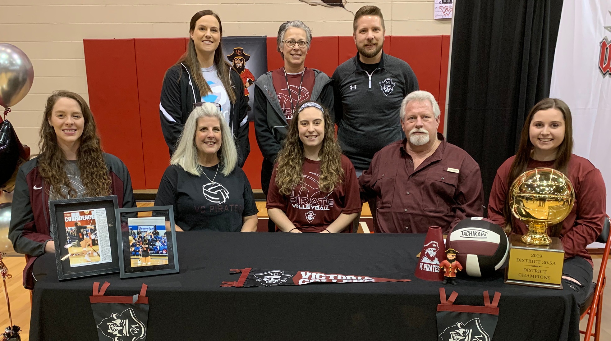 Victoria West's Kia Willborn signed a letter-of-intent to play volleyball at Victoria College on Wednesday. Pictured are, seated from left, VC assistant Allison Volkmer; Willborn's mother, Darlene Willborn; Kia Willborn; Willborn's father, Chris Willborn; and VC assistant Skylar Chreene. Standing from left are Southern Swing Club Director Jamye Byrne, West coach Alysia Hill and VC head coach Josh Moore.