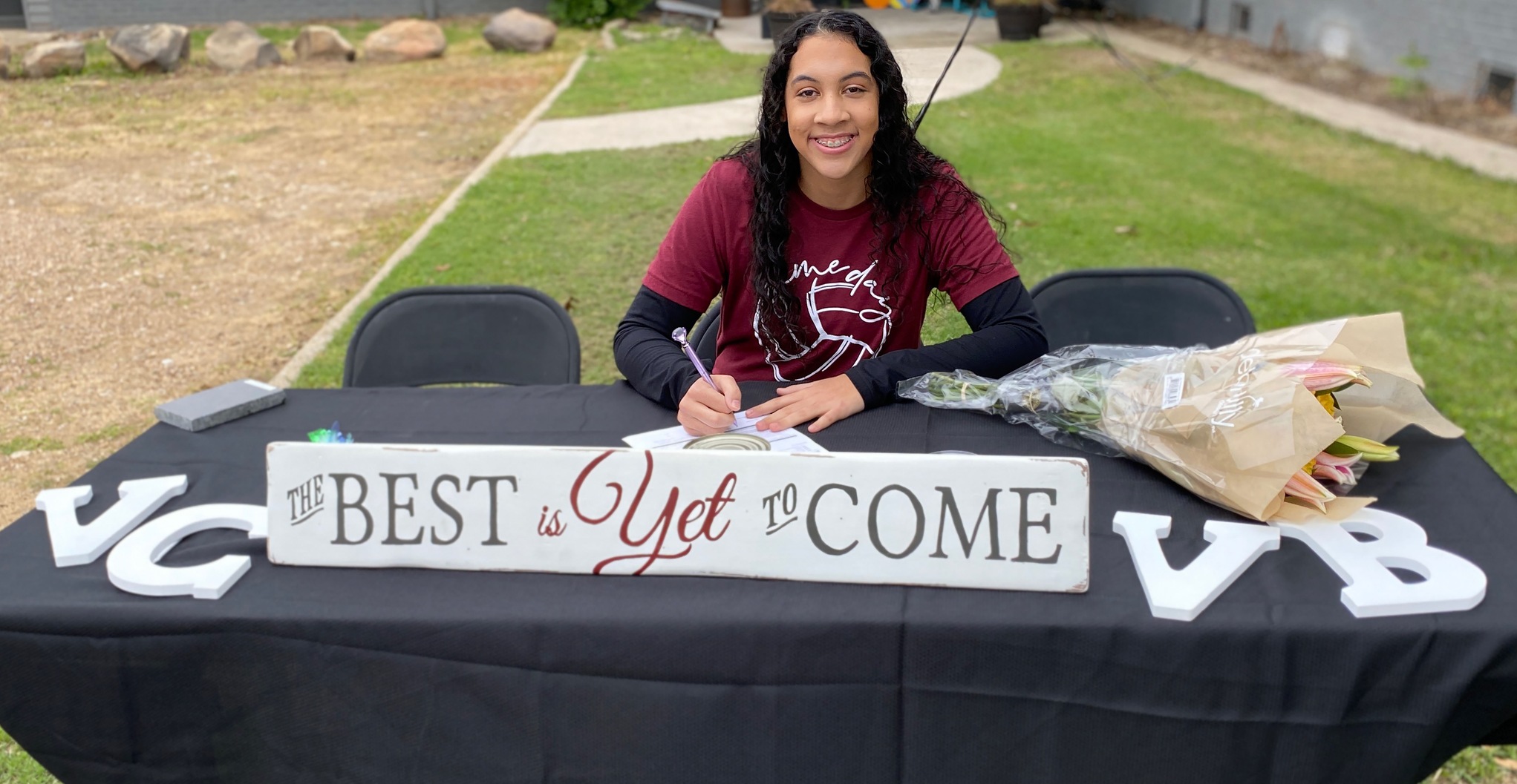Haltom’s Alexandria Baker-Cooper signs a volleyball letter-of-intent with Victoria College from her home.